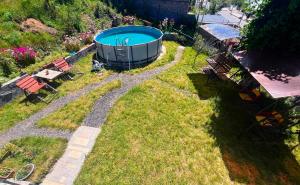 a swimming pool in the middle of a yard at Welcome house in Dilijan