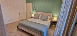 Ένα ή περισσότερα κρεβάτια σε δωμάτιο στο Lucca's Green Gem Home