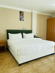 Postel nebo postele na pokoji v ubytování Kenenisaresortandsportcenter