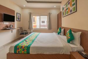 Katil atau katil-katil dalam bilik di Treebo Raj Palace