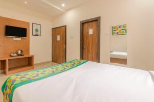 Katil atau katil-katil dalam bilik di Treebo Raj Palace