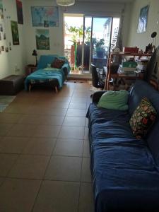 Ένα ή περισσότερα κρεβάτια σε δωμάτιο στο Au refuge citadin