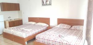 Postel nebo postele na pokoji v ubytování ROOMS fronte lago