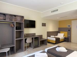 TV a/nebo společenská místnost v ubytování Hotel Giacosa