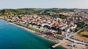 an aerial view of a town on the beach at Tilemaxos Apartment in Ierissos