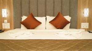 Letto o letti in una camera di Hotel Devdeep Porvorim