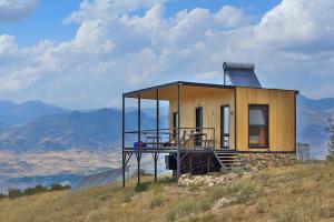 a small house on top of a hill at Sareni in Areni
