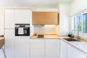 Kuchyň nebo kuchyňský kout v ubytování Apartamento La Carolina + 13 fotografií