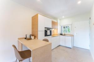 Kuchyň nebo kuchyňský kout v ubytování Apartamento La Carolina