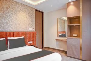 Postel nebo postele na pokoji v ubytování Hotel O Vrindavan