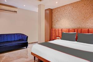 Postel nebo postele na pokoji v ubytování Hotel O Vrindavan