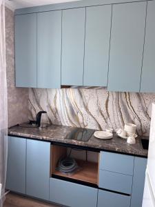 Køkken eller tekøkken på Квартира