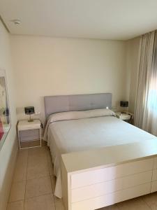Ein Bett oder Betten in einem Zimmer der Unterkunft Aparthotel Novo Resort