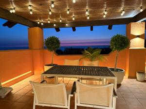 Ein Balkon oder eine Terrasse in der Unterkunft Aparthotel Novo Resort