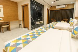 Letto o letti in una camera di The Sky Imperial Unity Inn