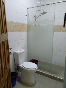 Koupelna v ubytování Kurvic Hotel & Suites