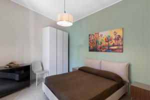 Ένα ή περισσότερα κρεβάτια σε δωμάτιο στο casa margherita 600 metri dal mare +23 φωτογραφίες