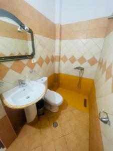 Koupelna v ubytování Bleta Rooms
