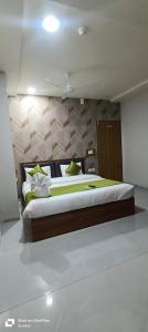 Ένα ή περισσότερα κρεβάτια σε δωμάτιο στο Hotel Cloud 7