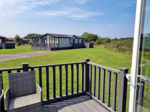 a view from the balcony of a house at Cherry Blossom 38 Hot Tub in Garton