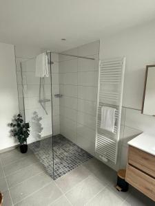 Et badeværelse på Cottage Cozy Gästehaus