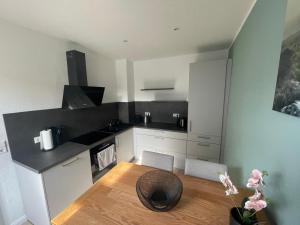 Køkken eller tekøkken på Cottage Cozy Gästehaus + 1 billede