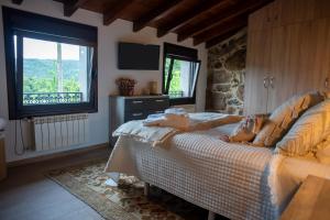 Ένα ή περισσότερα κρεβάτια σε δωμάτιο στο Villa Limia