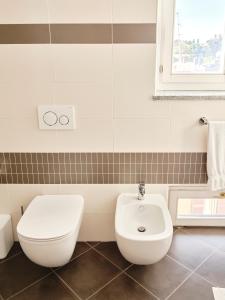 Koupelna v ubytování Appartamento con 2 stanze e 2 bagni