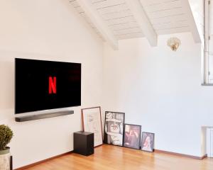 TV a/nebo společenská místnost v ubytování Appartamento con 2 stanze e 2 bagni