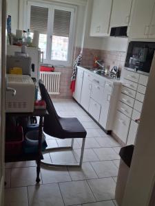 Кухня или мини-кухня в Appartement équipé à louer à Ecublens
 +4 фотографии