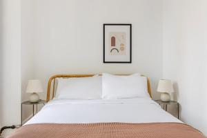 Voodi või voodid majutusasutuse Blueground Midtown West washerdryer nr Central Park NYC-1876 toas