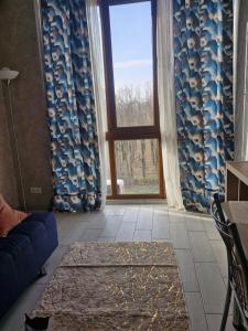 Posezení v ubytování Квартира