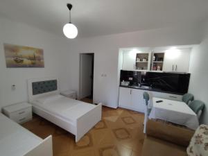 Postel nebo postele na pokoji v ubytování Real apartment