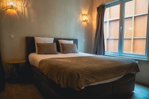 Postel nebo postele na pokoji v ubytování Japandi Lofts - 2 Bedrooms at old city of Antwerp