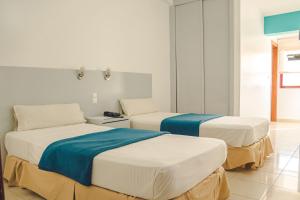 Hotel LIVVO Don Paco房間的床