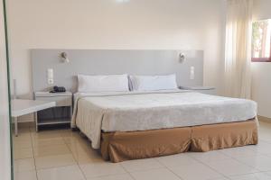 Hotel LIVVO Don Paco房間的床
