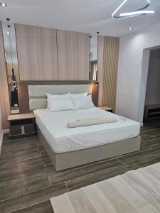 Ένα ή περισσότερα κρεβάτια σε δωμάτιο στο Private Villa AL Mamsha With Private Pool