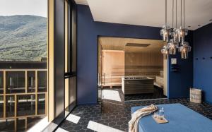 Postel nebo postele na pokoji v ubytování Falkensteiner Hotel Bozen WaltherPark