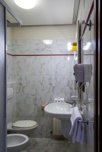 Koupelna v ubytování Hotel Bernardino