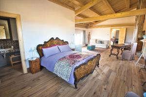 Postel nebo postele na pokoji v ubytování Agriturismo Pietre di Gelo