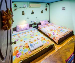 Postelja oz. postelje v sobi nastanitve Shannkalay Hostel