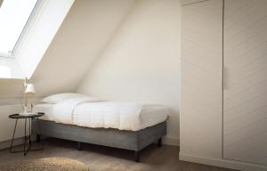 Ένα ή περισσότερα κρεβάτια σε δωμάτιο στο G-17 Bouwlust