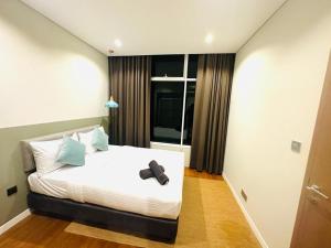 vortex suites klcc by twin tower vibes客房内的一张或多张床位