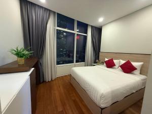 vortex suites klcc by twin tower vibes客房内的一张或多张床位