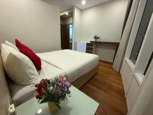 vortex suites klcc by twin tower vibes客房内的一张或多张床位