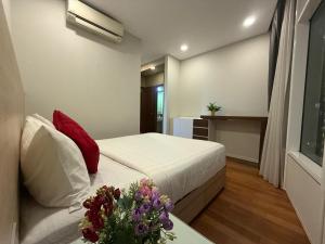 vortex suites klcc by twin tower vibes客房内的一张或多张床位