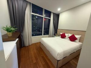 vortex suites klcc by twin tower vibes客房内的一张或多张床位