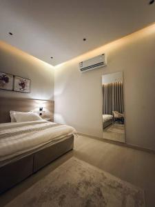 Ένα ή περισσότερα κρεβάτια σε δωμάτιο στο GUEST HOUSe