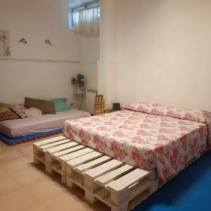 Ένα ή περισσότερα κρεβάτια σε δωμάτιο στο Taverna Sport +10 φωτογραφίες