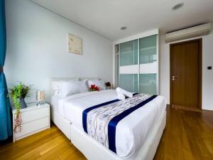 vortex suites klcc by twin tower vibes客房内的一张或多张床位